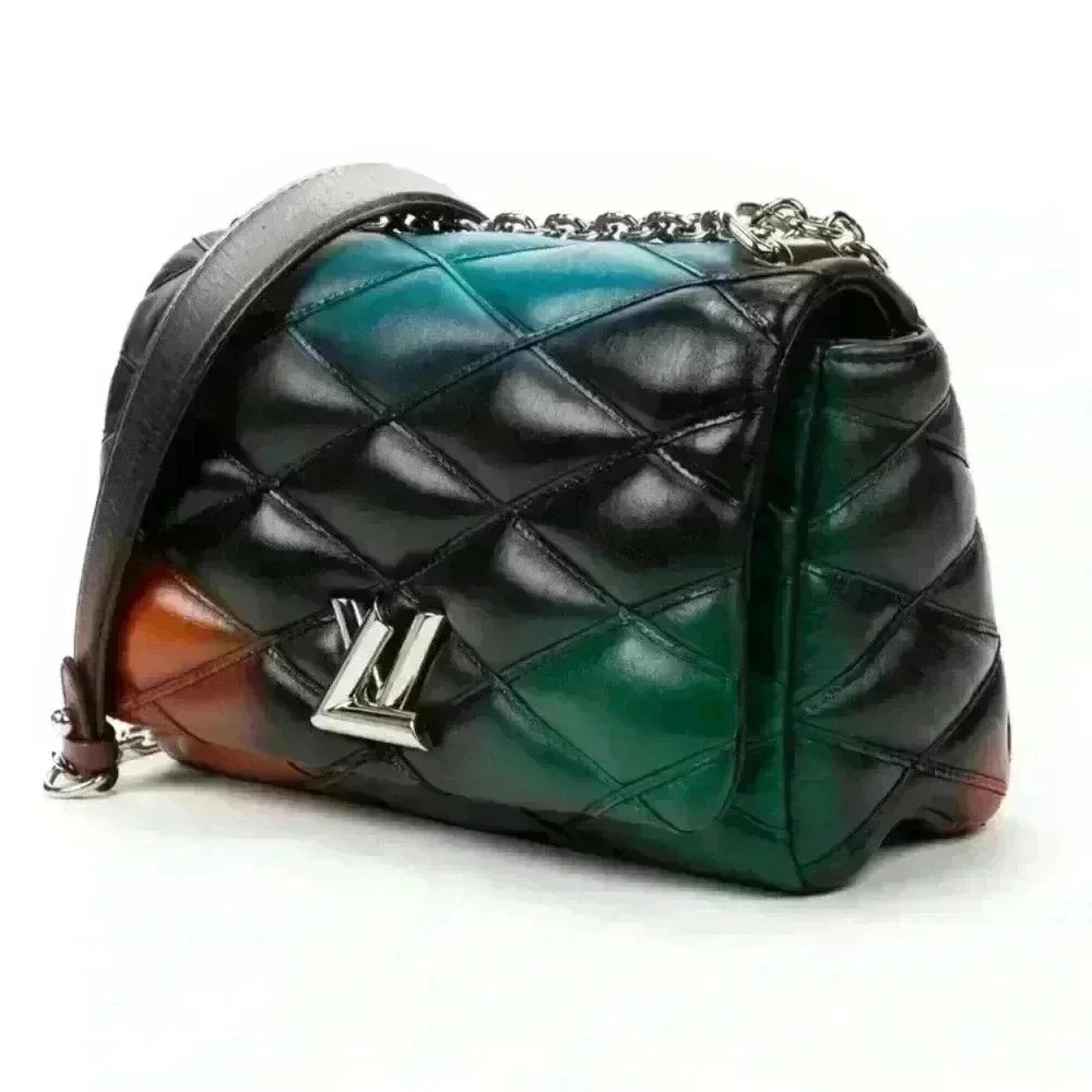 Authentic Louis Vuitton twist lock Puff GO 14 PM- COA INCLUDED